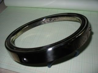 Outside of re-nickeled headlite rim